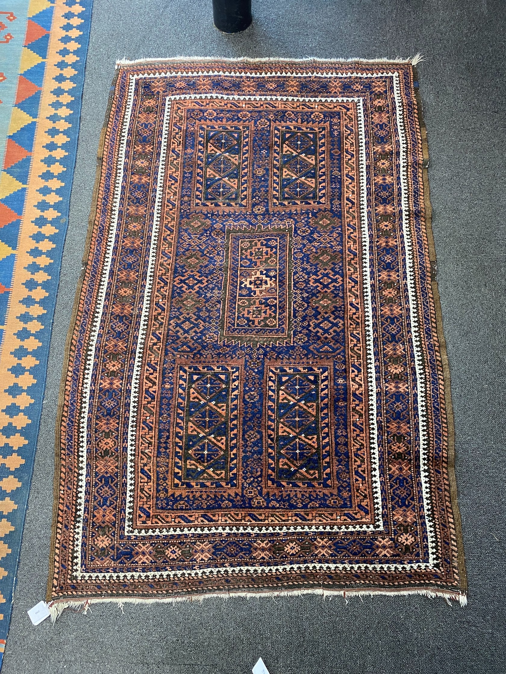 A Belouch blue ground rug, 156 x 102cm